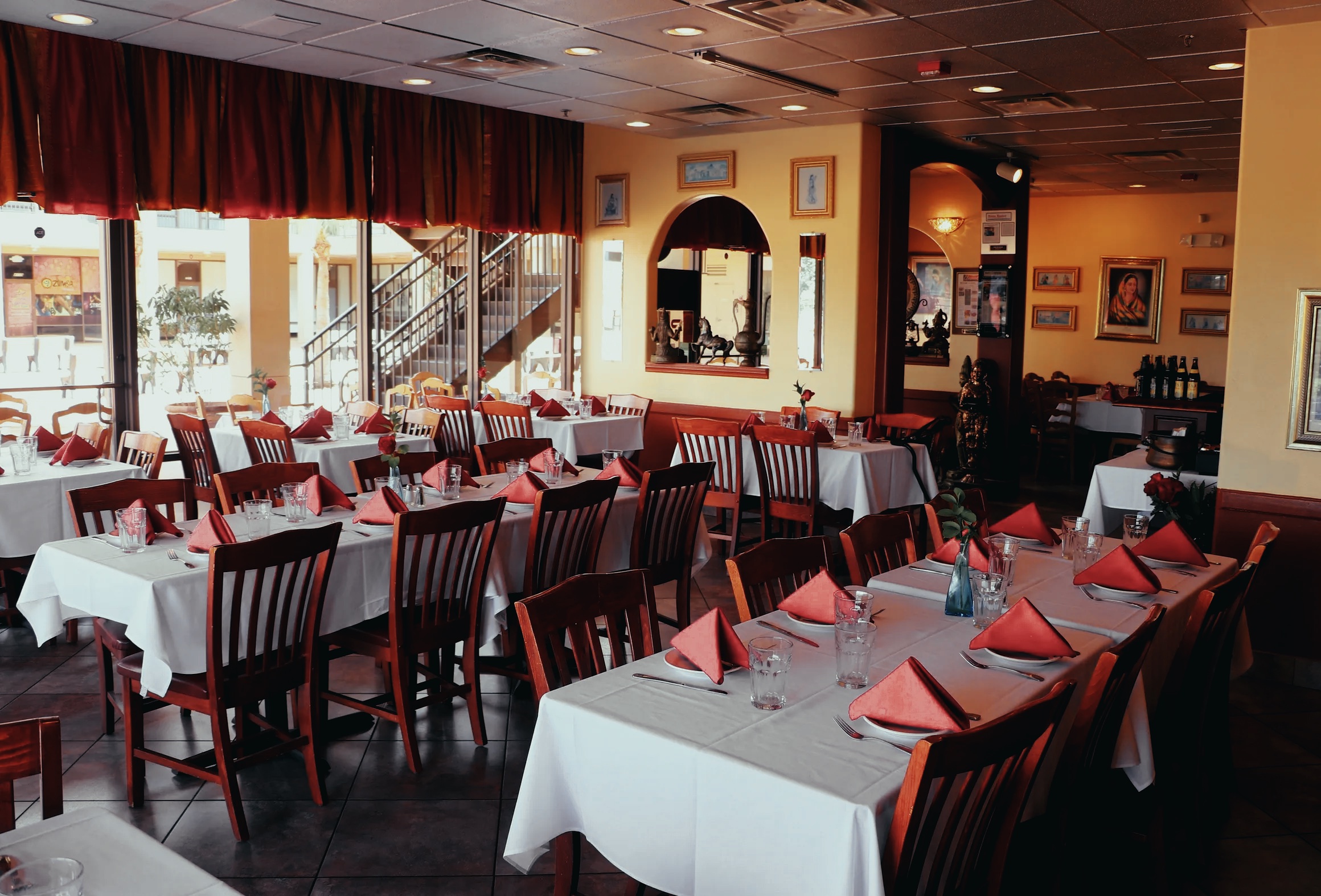 Inside Guru Restaurant with dining chairs and tables